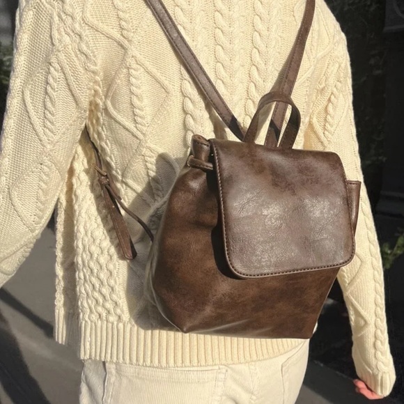 Brandy Melville Handbags - Brandy Melville faux leather brown mini backpack